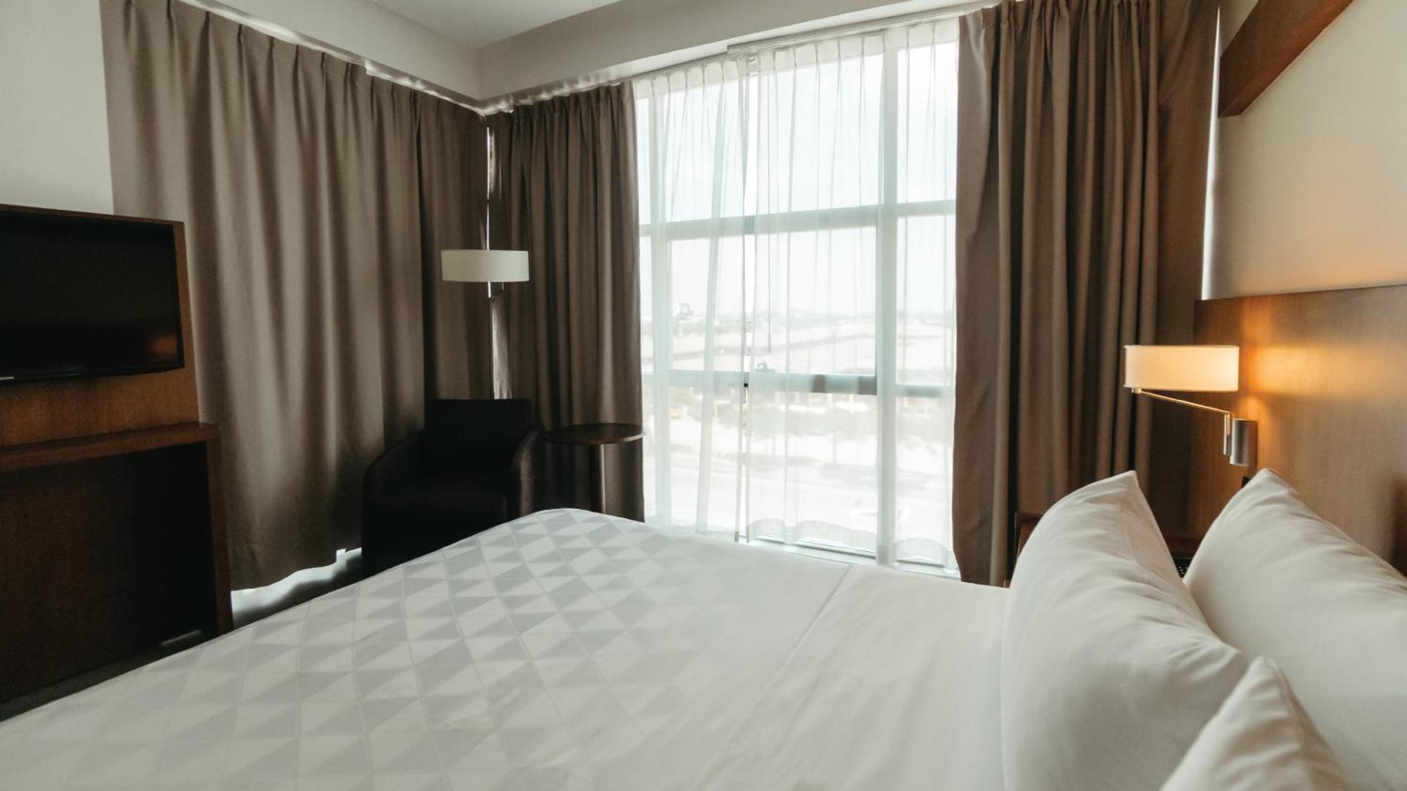 Holiday Inn Guayaquil Airport By Ihg Екстериор снимка A bedroom at the hotel