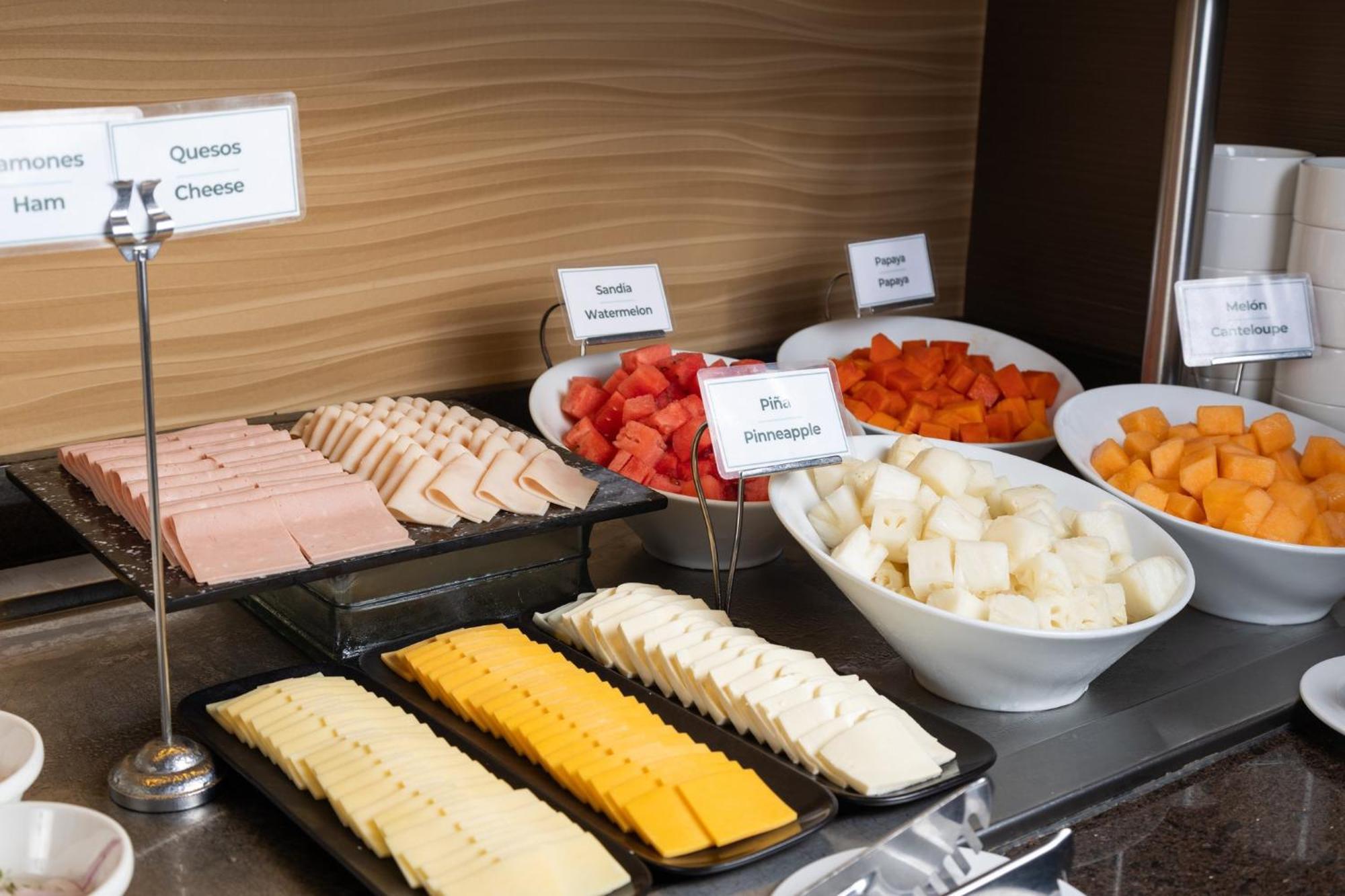 Holiday Inn Guayaquil Airport By Ihg Екстериор снимка A selection of cheese at a buffet